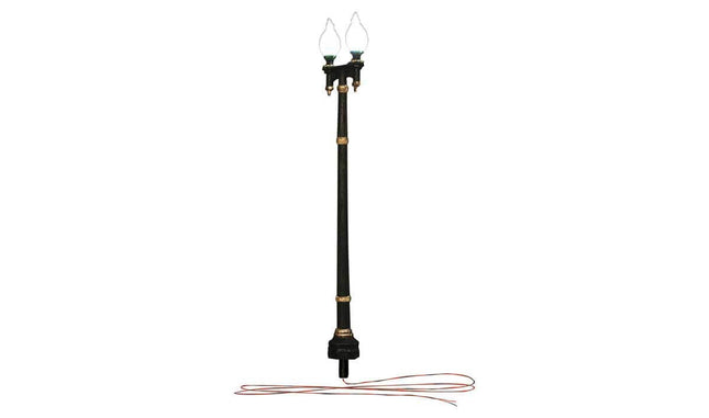 Wooden pole double lamp post street light for HO scale model train layouts with warm white LED lights and wiring.