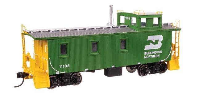 Walthers Proto 30' GTW Style Wood Caboose Burlington Northern #11105 model in HO scale, featuring vibrant green and yellow colors.