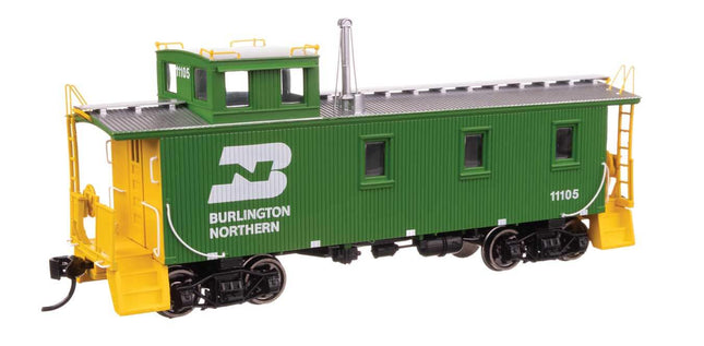 Burlington Northern 30' style wood caboose model #11105 in green and yellow, ready to run, HO scale.