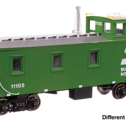 Burlington Northern HO scale 30' GTW style wood caboose with offset cupola, model #11105, green and yellow design.