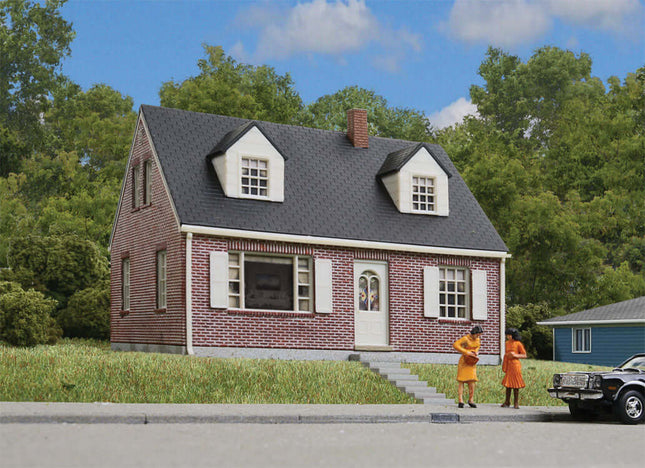 Walthers Cornerstone Brick Cape Cod House model kit, perfect for HO Scale suburban layouts.