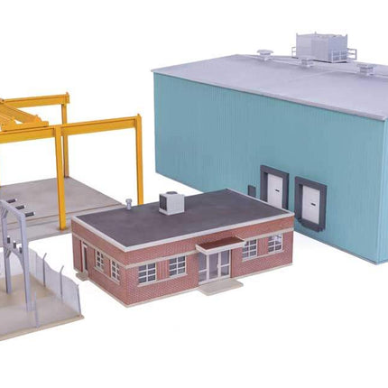 Walthers HO Transformer Factory kit featuring industrial building, overhead crane, substation, and detailed components.