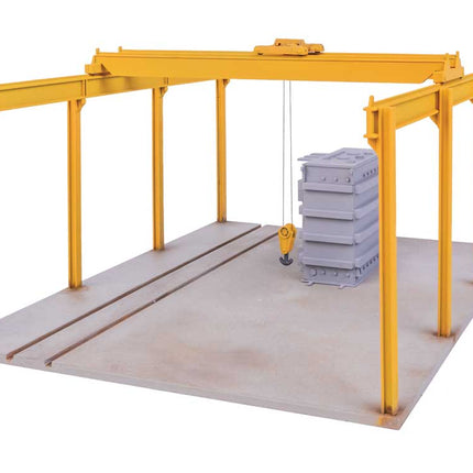HO scale Transformer Factory kit with overhead crane and transformer load on a detailed industrial platform.