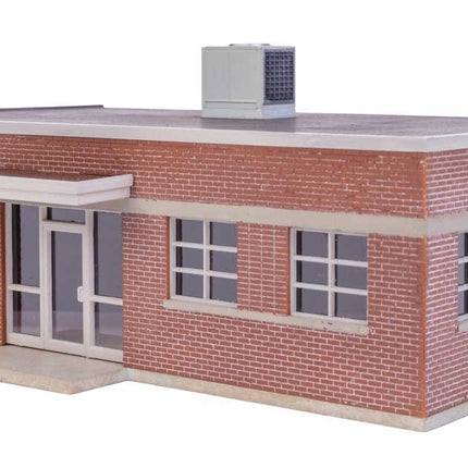 Walthers HO Transformer Factory building model with detailed brick exterior, overhead crane, and roof cooling units.