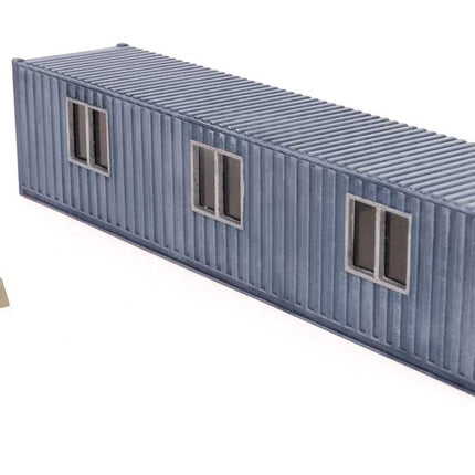 Corn syrup transfer building kit model in HO scale with detailed container and loading dock.