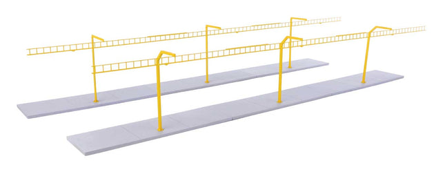 Walthers Cornerstone Transload Facility Safety System model kit with yellow safety poles and gray base for HO scale railway layout.