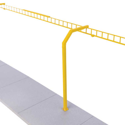 Yellow safety loading rack for HO scale model railways, part of Walthers Cornerstone Transload Facility kit.