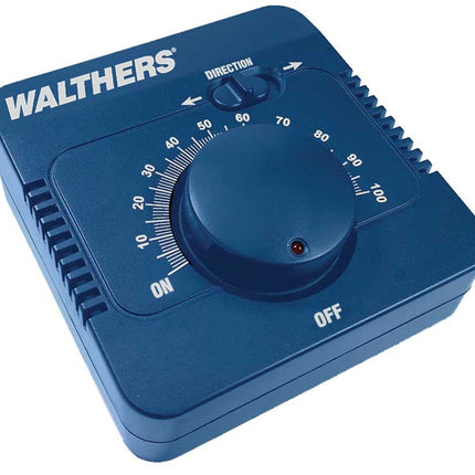 Walthers 942-4000 DC train controller with speed dial, ON/OFF switch, and direction control for model trains.