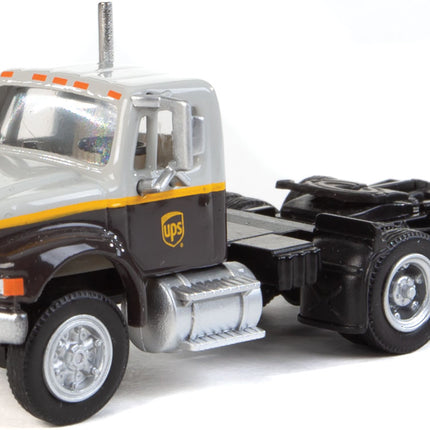 Walthers SceneMaster 949-11186 | International(R) 4900 Dual-Axle Semi Tractor Only - Assembled - UPS Freight(SM) (gray, gold, brown) | HO Scale