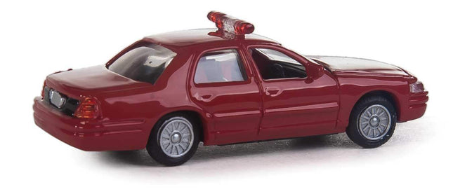Walthers SceneMaster Ford Crown Victoria Police Interceptor model in red with emergency lights, HO scale vehicle.