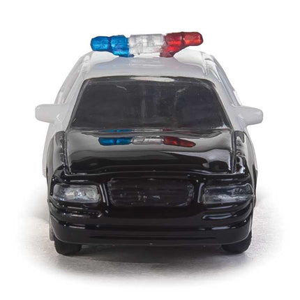 Walthers HO Ford Crown Victoria Police Interceptor model in black and white with light bar on top.