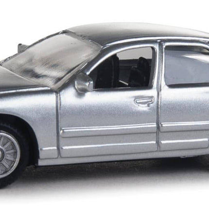 Walthers SceneMaster unmarked Ford Crown Victoria Police Interceptor in silver, HO scale model vehicle, fully assembled.