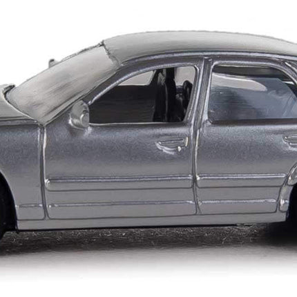 Walthers SceneMaster HO scale silver Ford Crown Victoria Police Interceptor model, perfect for realistic city scenes.