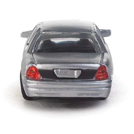 Rear view of a silver HO scale Ford® Crown Victoria Police Interceptor model by Walthers SceneMaster.