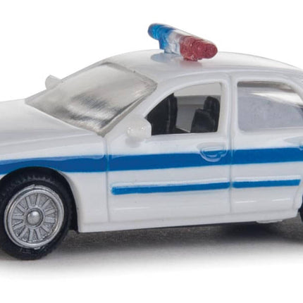 Walthers HO Ford Crown Victoria Police Interceptor model in white with blue stripe, fully assembled with rooftop lightbar.