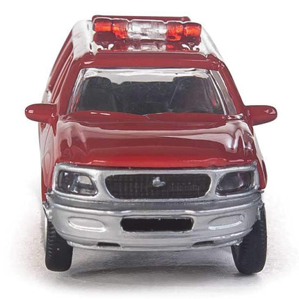 Red Ford Expedition SSV with lightbar, HO scale assembled vehicle for fire command scenes.