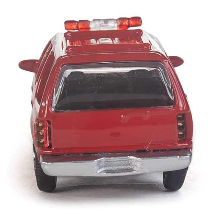 Rear view of Walthers SceneMaster Ford Expedition SSV model in red with lightbar, perfect for HO scale fire scene layouts.