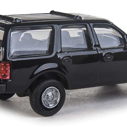 Walthers SceneMaster Ford Expedition Special Service Vehicle in unmarked black - detailed HO scale model for layouts.