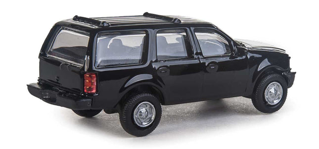 Walthers SceneMaster Ford Expedition Special Service Vehicle in unmarked black - detailed HO scale model for layouts.
