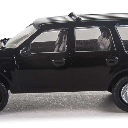 Walthers SceneMaster Ford Expedition SSV unmarked black HO scale model vehicle for realistic layouts.