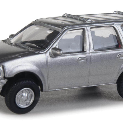 Walthers SceneMaster HO scale silver Ford Expedition Special Service Vehicle unmarked model with detailed design.