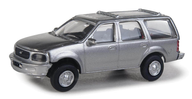 Walthers SceneMaster HO scale silver Ford Expedition Special Service Vehicle unmarked model with detailed design.