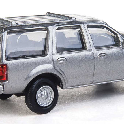 Walthers SceneMaster Ford Expedition SSV model in silver, unmarked, ready for HO scale layouts.