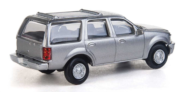 Walthers SceneMaster Ford Expedition SSV model in silver, unmarked, ready for HO scale layouts.