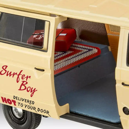 Interior view of Revell's VW Vanagon model with Surfer Boy Pizza details, featuring a crochet blanket and pizza delivery bag.