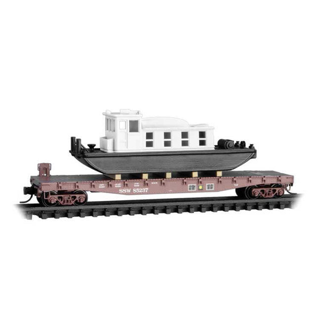 Micro Trains N Scale 50' fishbelly-side flatcar with tug boat load, Cotton Belt SSW #85237, realistic model train accessory.