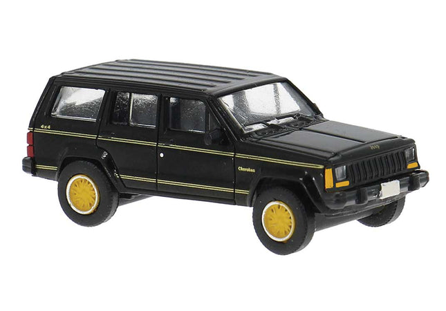 PCX87 PCX870728 1984 Jeep Cherokee HO Scale - black SUV with gold pinstriping and gold alloy wheels