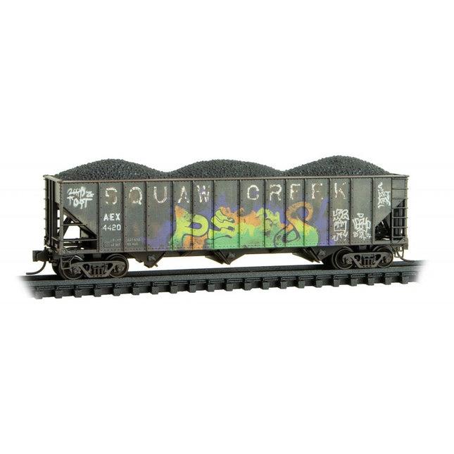 Micro Trains 99305034 | 100-Ton 3-Bay Ribside Open Hopper w/Load 2-Pack (Foam Insert) - Ready to Run - Squaw Creek Coak AEX #4420, 4421 (Weathered, black, Graffiti) | N Scale