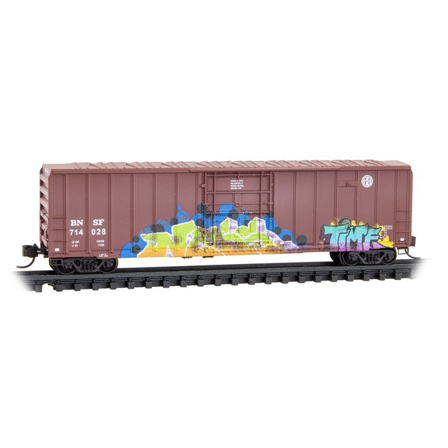 Micro Trains 98305048 | 50' Rib-Side Plug-Door Boxcar No Roofwalk 3-Pack (Jewel Cases) - Ready to Run - BNSF Railway #714028, 714235, 714243 (Weathered, Boxcar Red, Graffiti) | N Scale