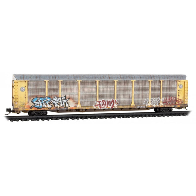 Micro Trains 11144103 | 89' Tri-Level Enclosed Auto Rack - Ready to Run - BNSF Railway TTX #852068 (Weathered, yellow, silver, black, graffiti) | N Scale