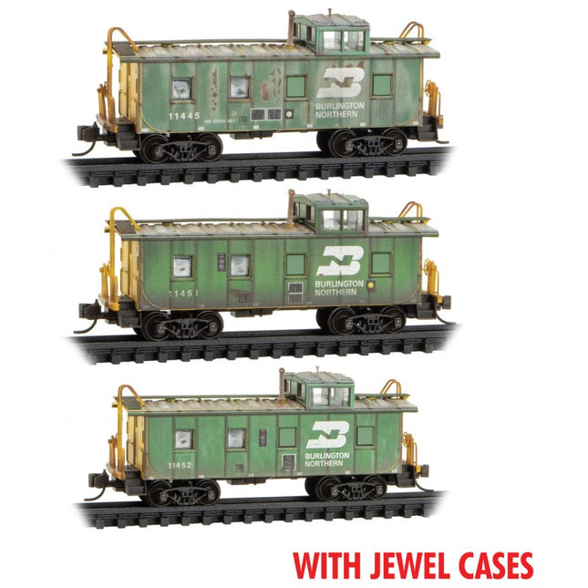 Micro Trains 98305055 | 36' Riveted Steel Cupola Caboose 3-Pack (Jewel Cases) - Ready to Run - Burlington Northern #11445, 11451, 11452 (Weathered, Cascade Green, yellow) | N Scale