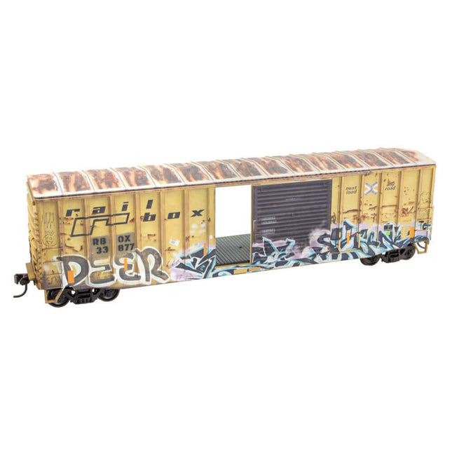 Micro-Trains HO Railbox 50' exterior boxcar #33877 with weathered finish and graffiti, part of Grit N Grime Series.