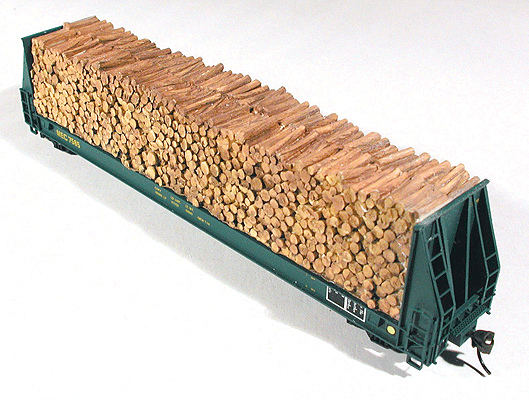 Cast resin freight car load of pulpwood for model trains, designed for Walthers 52' HO scale cars.