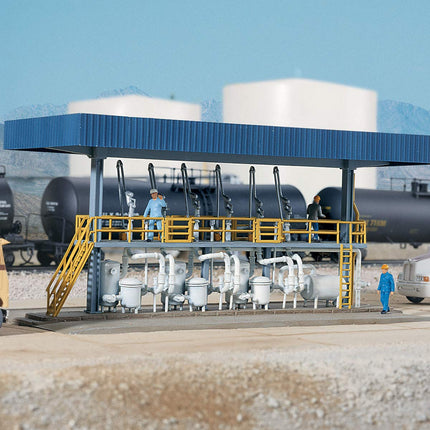 Walthers Cornerstone 933-3169 Tanker Truck Loading Rack HO Scale - assembled close-up with tank cars and tank trucks