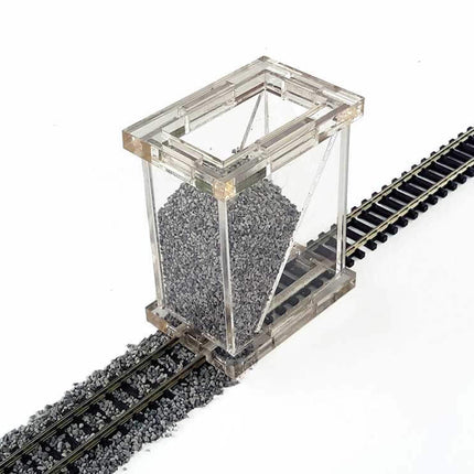 Bachmann 39002 N Scale ballast spreader on model train tracks, showcasing a realistic ballast spreading effect.