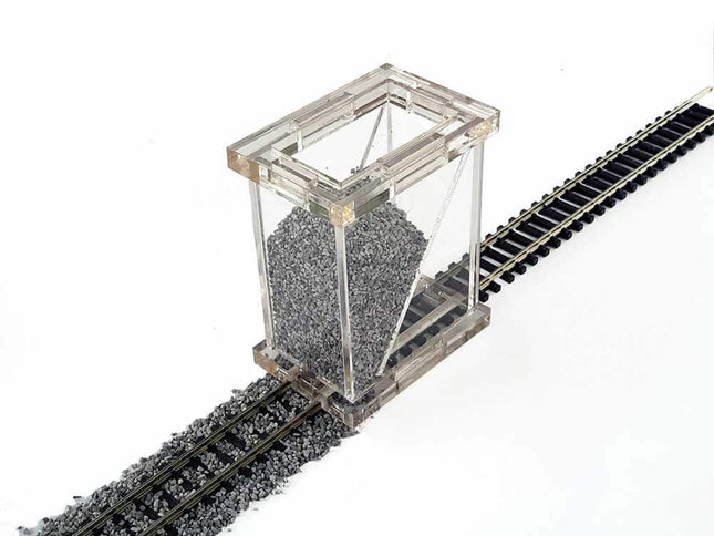 Bachmann 39002 N Scale ballast spreader on model train tracks, showcasing a realistic ballast spreading effect.