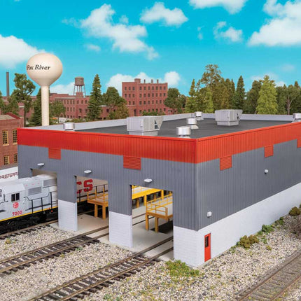 Walthers Cornerstone 933-3908 Modern Diesel Shop Kit HO Scale - assembled shop in an engine terminal scene