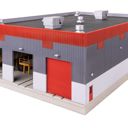 Walthers Cornerstone 933-3908 Modern Diesel Shop Kit HO Scale - assembled model, angled view with roll-up doors