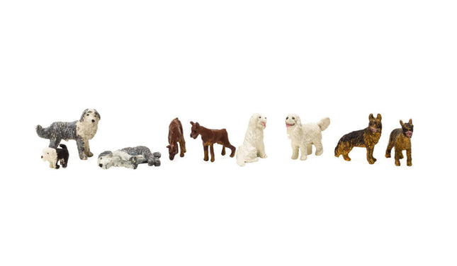 Woodland Scenics Dog Pack - Assembled HO scale figures of various dog breeds in different poses.