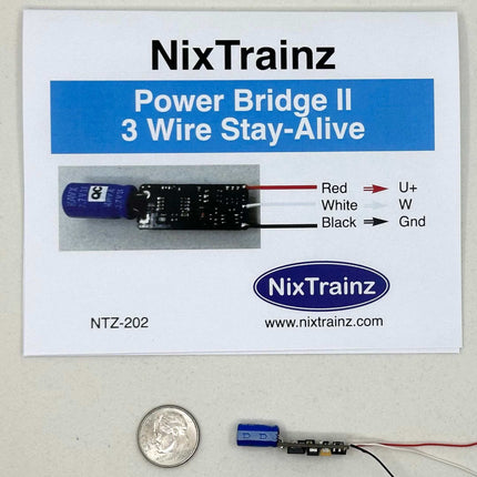 NixTrainz Power Bridge II 3-Wire Stay-Alive solution with instructions, small circuit board, and quarter for scale.