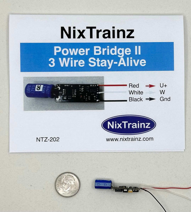 NixTrainz Power Bridge II 3-Wire Stay-Alive solution with instructions, small circuit board, and quarter for scale.