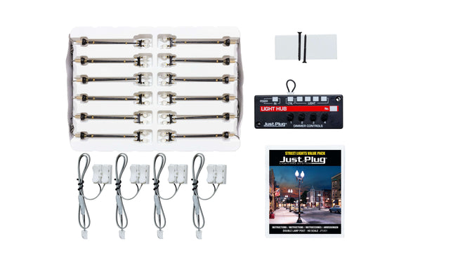 Woodland Scenics Just Plug Value Pack includes 12 double lamp post street lights, light hub, and wiring for easy installation.