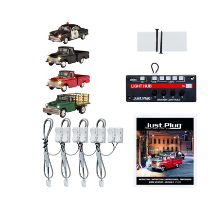 Woodland Scenics Just Plug Value Pack with HO Scale work vehicles, light hub, and accessories for dynamic layouts.