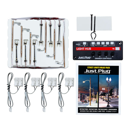 Just Plug Value 12 Pack with Light Hub, wooden pole street lights, linkers, and instructional materials for N Scale models.