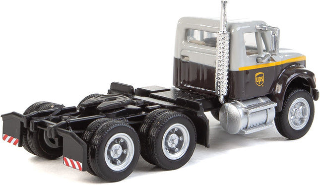 Walthers SceneMaster 949-11186 | International(R) 4900 Dual-Axle Semi Tractor Only - Assembled - UPS Freight(SM) (gray, gold, brown) | HO Scale - Squeaky's Trains