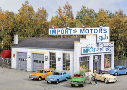 Walthers Cornerstone 933-4023 | Import Motors Car Dealership - Service Bays, Rooftop Sign - Building Kit | HO Scale